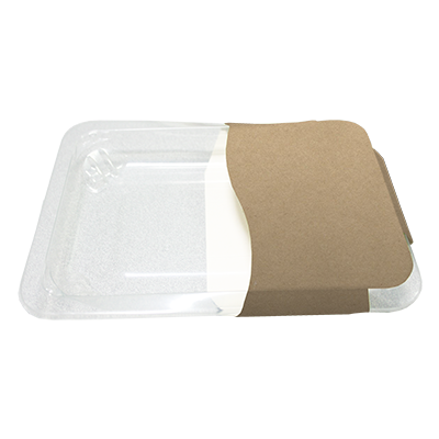 Guelt | Pose de fourreau demi-enveloppe en carton plat sur barquette